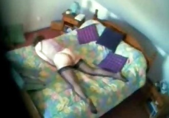 My mom caught masturbating on bed. Hidden cam - 57 sec