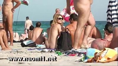 naomi1 handjob a young guy on a public beach - 1 min 5 sec
