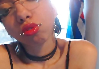Tongue Teasing and Kissing Glass Dildo after Applying Sheer Pink Lip Gloss