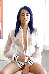 Thin beauty Janice Griffith flashing bald pussy before covering herself in oil
