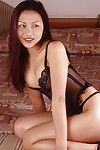Adorable asian babe on high heels showing off her small tits and pussy