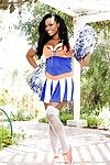 Ebony cheerleader Tori Taylor uncovers boobs & flashes her pussy on patio