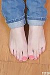 Cute teen girl Felicia removes shoes and reveals pretty painted toes