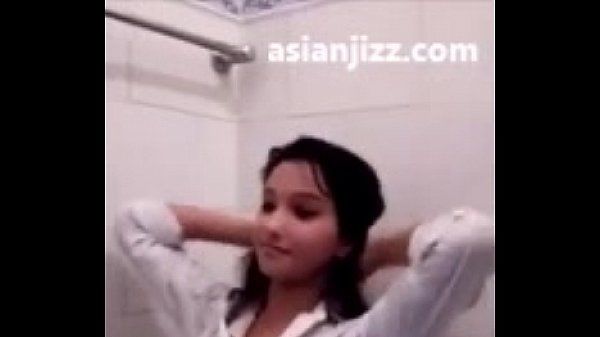 Beautiful Asian student undress and take a bath
